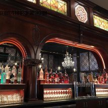 Custom Back Bar with Raised Bottle Displays Custom Back Bar with Raised Bottle Displays