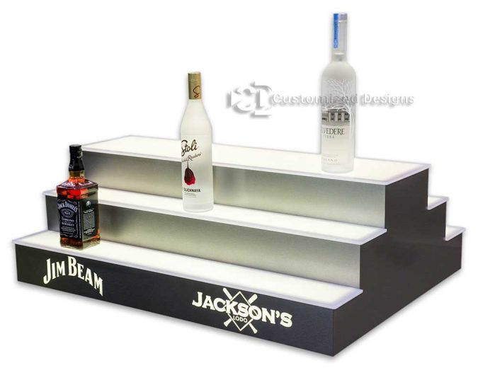 Custom illuminated logo on an LED island bottle display